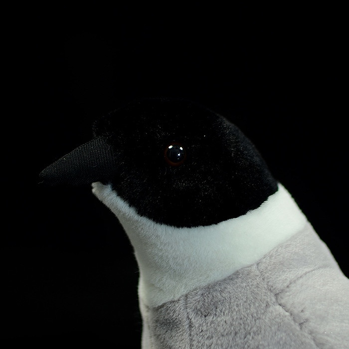 Peluche morbido di gazza dalle ali azzurre