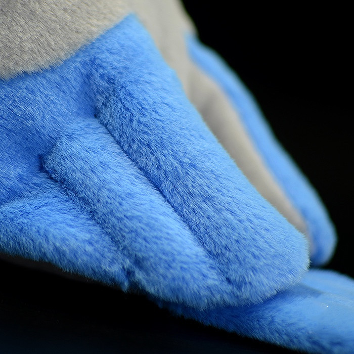 Peluche morbido di gazza dalle ali azzurre